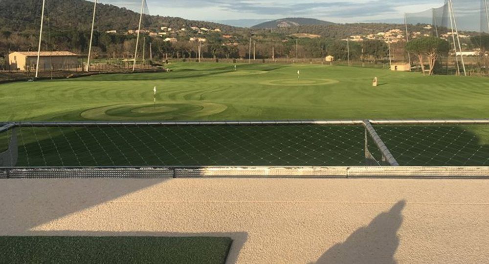 Fresno Synthetic turf beside natural grass golf course