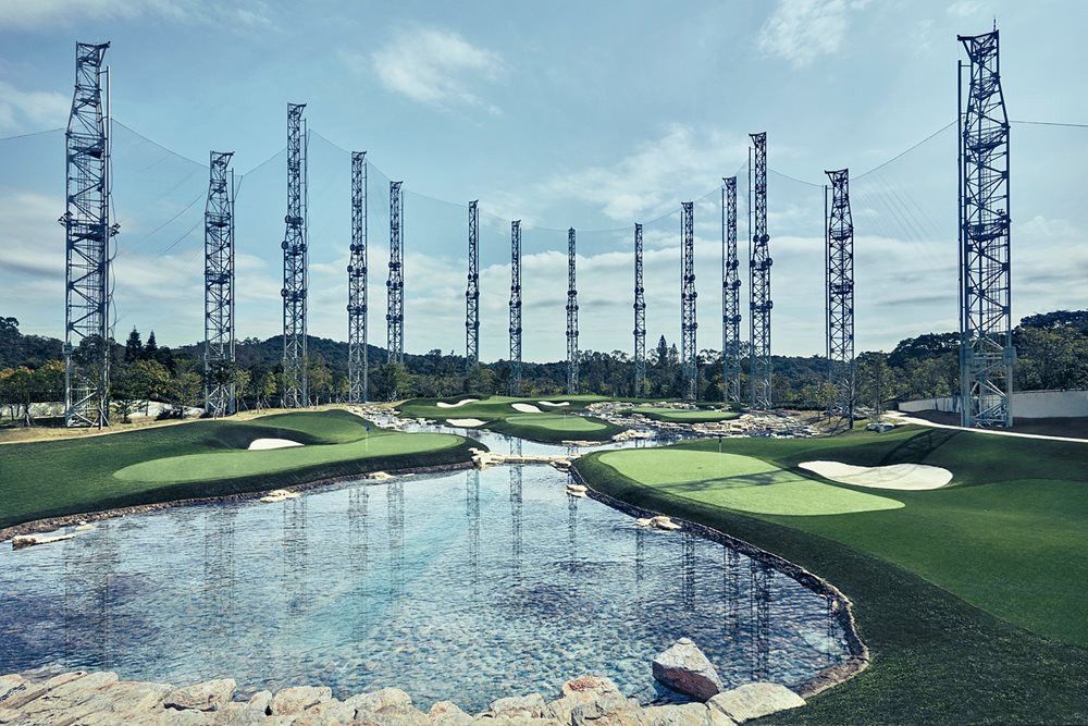 Fresno Synthetic grass golf course with water and tall metal towers